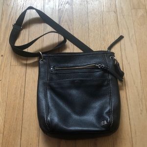Medium size cross body black leather purse